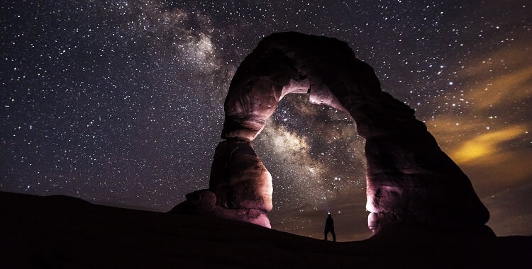 stone arch under a starry sky