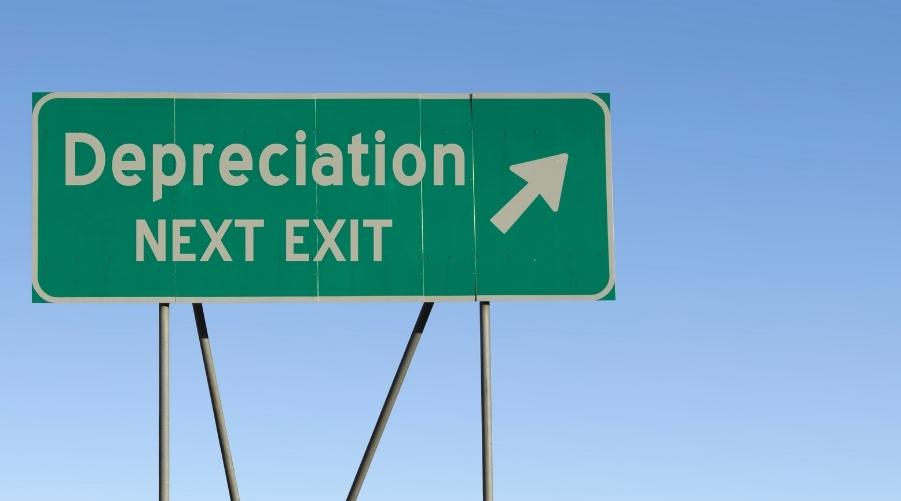 Blog header image for depreciation methods post of a road sign indicating the next exit leads to depreciation